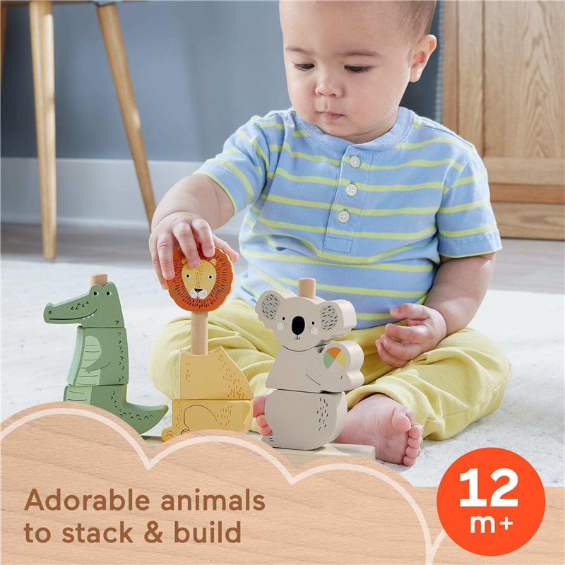 Baby playing with Fisher Price wooden animal stacking toy featuring a crocodile, lion, and koala. Suitable for ages 12 months and older.