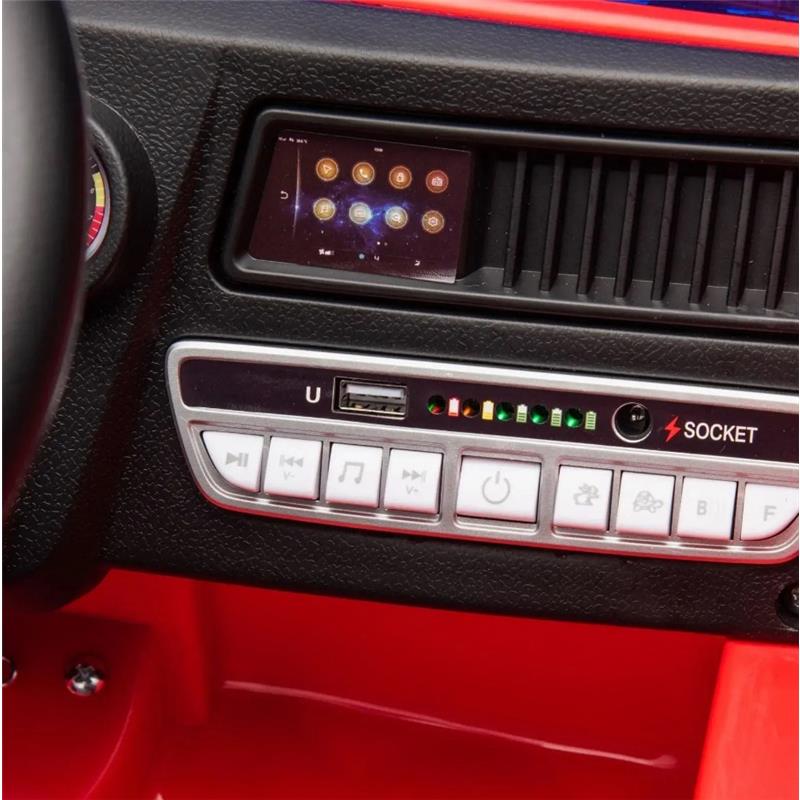 Dashboard view of the Freddo 1 Seater Fire Truck showing controls, a USB port, and an indicator light panel.