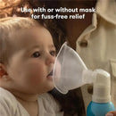 Nasal inhaler used on a baby for soothing stuffy nose, featuring a clear inhalation mask and a blue saline mist bottle.