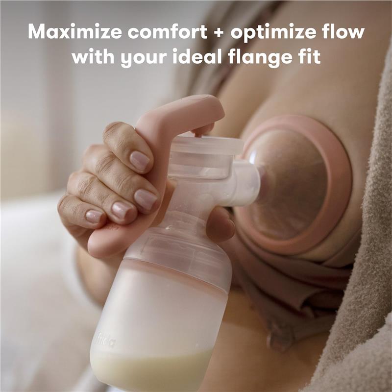 Frida Mom breast pump flange insert in use, highlighting comfort and flow optimization for breastfeeding.