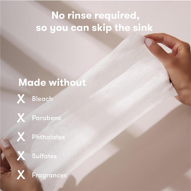 Frida Mom Breast Pump Wipes being held, highlighting features: no rinse needed, and free from bleach, parabens, phthalates, sulfates, and fragrances.