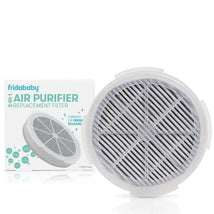 Fridababy 3-in-1 air purifier replacement filter, featuring a circular design with visible pleated material, beside its packaging.