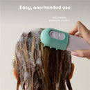 Fridababy Control The Flow Bathtub Sprayer attachment, designed for easy one-handed use, shown spraying water on soapy hair.