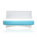 Fridababy 3-Step Cradle Cap System featuring a blue comb and a white silicone scrubber tool.