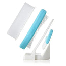 Fridababy 3-Step Cradle Cap System includes a soft brush, comb, and silicone pad, arranged on a white holder.