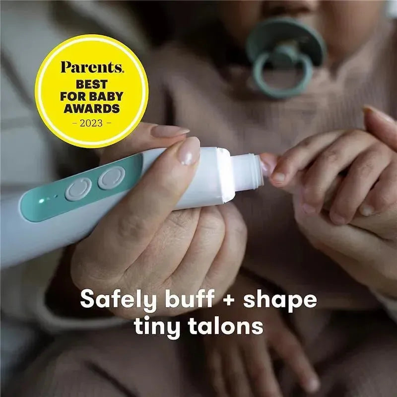 Electric nail buffer by Fridababy in use on a baby’s small hand, with a safety message displayed prominently.
