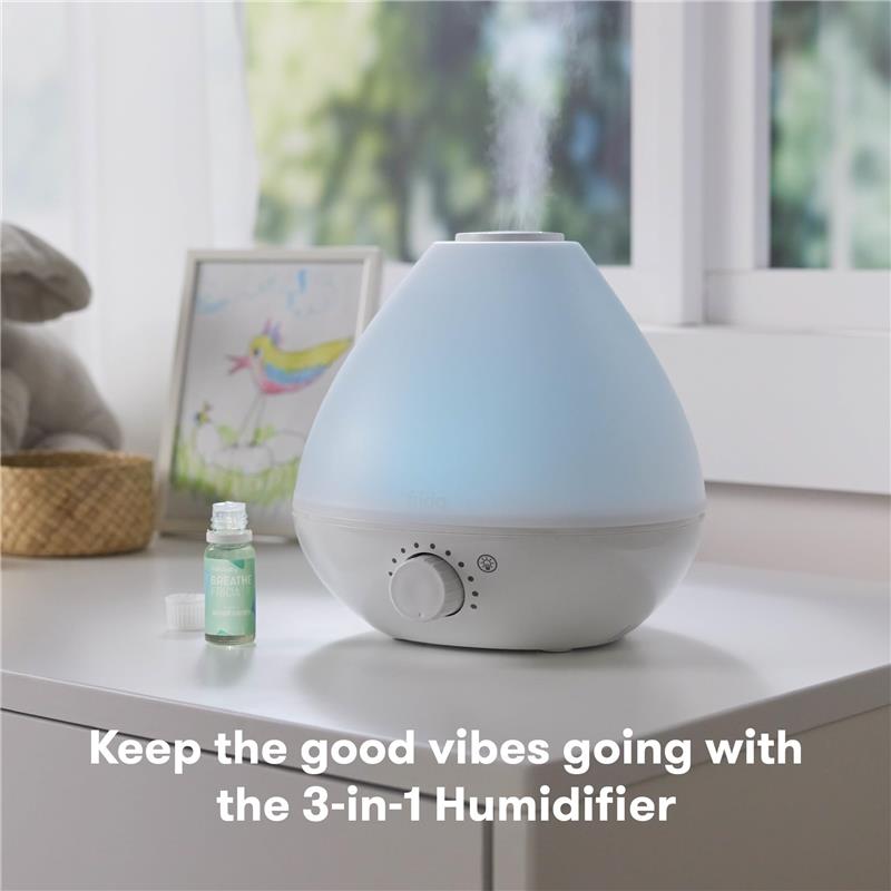 Eucalyptus & Lavender essential oil next to a FridaBaby humidifier with a blue light, promoting relaxation.