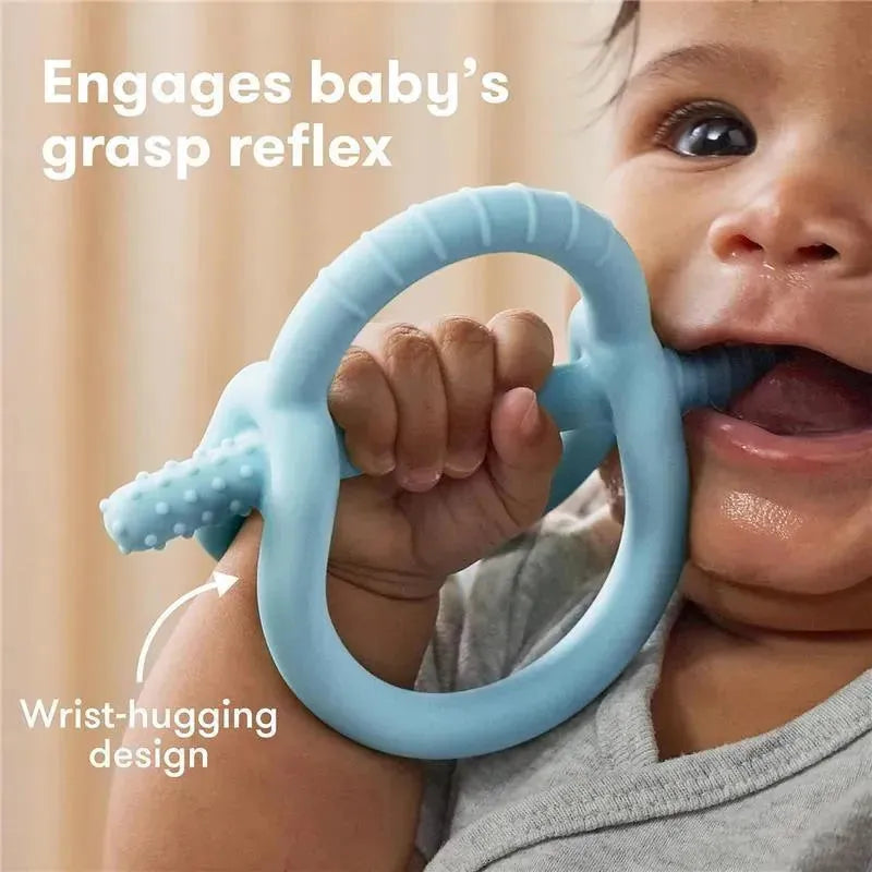 Muted blue FridaBaby Get-A-Grip Teether held by a baby, highlighting its wrist-hugging design and texture for teething.
