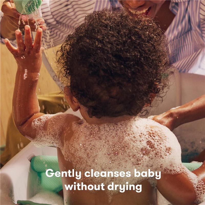 Fridababy Lavender Bubble Bath & Body Wash being used on a baby, with bubbles and gentle water action in a bath setting.