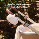 Portable hands-free rocker with gentle vibration, helping baby sleep, attached to a stroller with a taupe fabric bassinet.