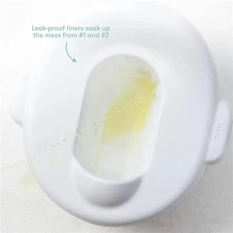 FridaBaby Potty Cleanup Essentials featuring a white potty with leak-proof liners designed for easy cleaning after use.