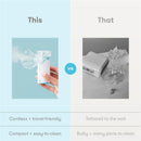 Portable nebulizer in hand producing mist, compared to a bulky tethered device with multiple parts.