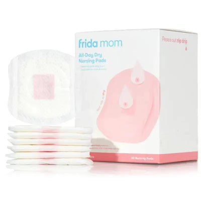 FridaMom All-Day Dry Nursing Pads packaging with six disposable pads in front, featuring a pink design and moisture barriers.