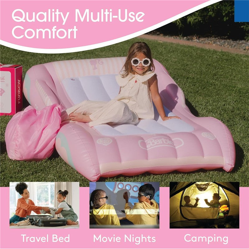 Kids air mattress featuring a pink Barbie design, with a girl sitting on it, located on grass. Includes travel bag.