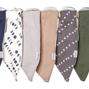 Multi-pack of Gerber baby girl bandana bibs in various colors and patterns, featuring pink and neutral tones with stylish prints.