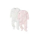 Two textured zip-up baby sleepers in white and pink, featuring pony prints and long sleeves, designed for comfort.