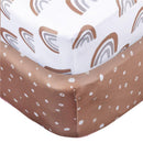 Knit crib sheet featuring a boho rainbow design in neutral tones, suitable for baby cribs.