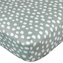 Green crib sheet with a white, scattered dot pattern, designed for babies, from the Gerber 2Pk Baby Unisex collection.