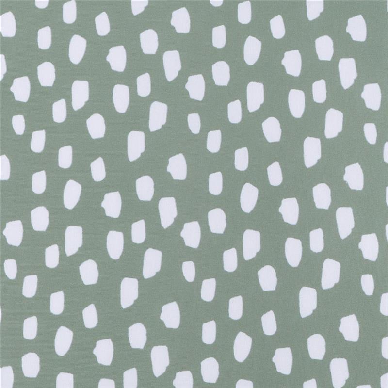 Knit crib sheet featuring a Dino Time pattern with a light green background and scattered white shapes.