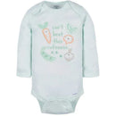 Long sleeve mint green onesie featuring playful vegetable graphics and the text “can’t beet this cuteness.”