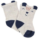 Crew socks for baby boys featuring a playful fox design with navy blue accents and a smiling face.