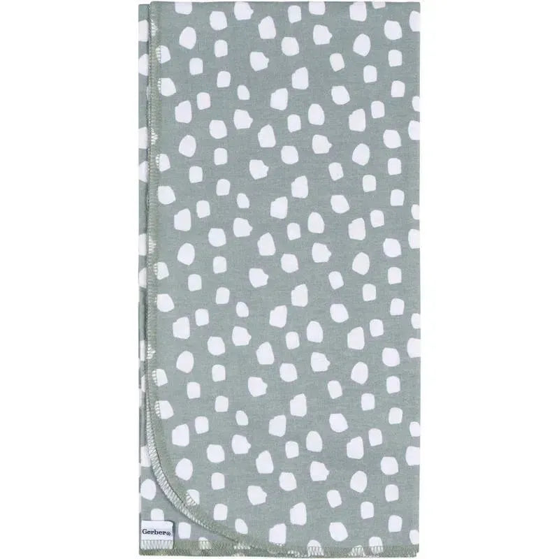 Flannel blanket featuring a light green background with white irregular spots, part of the Gerber Bedding collection.