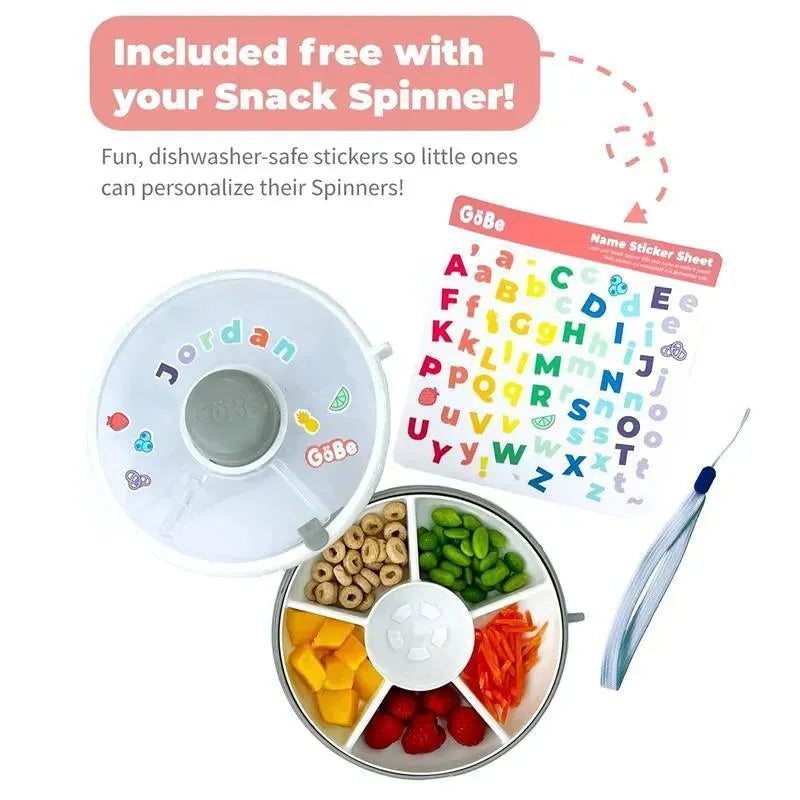 Blue GoBe Kids Snack Spinner bundle with hand strap and sticker sheet, featuring colorful, personalized stickers and various snacks.
