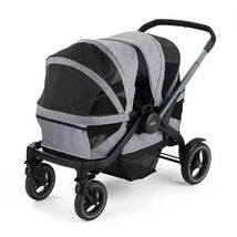 Graco Modes Adventure Stroller Wagon in gray and black, featuring a spacious dual seating area and mesh ventilation.
