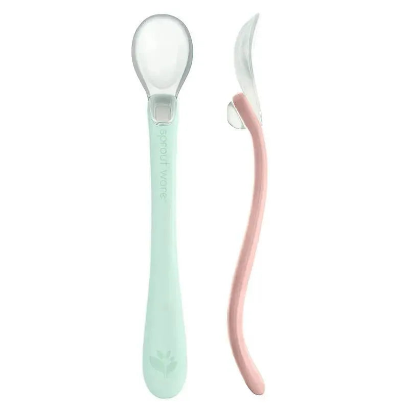 Silicone baby spoons in light sage and light grapefruit, featuring a clear scoop and ergonomic design for easy feeding.