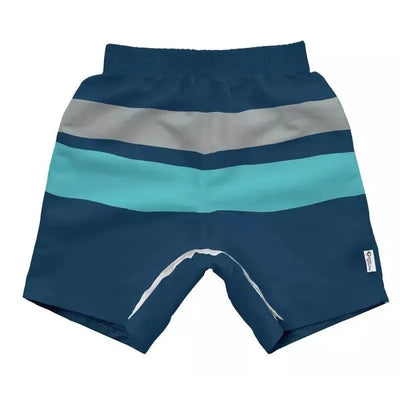 Navy swim trunks by Green Sprouts featuring blue and gray stripes, designed for easy changing and eco-friendliness.