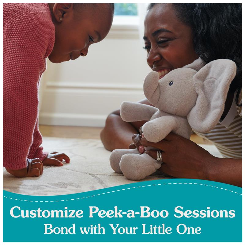 A girl and woman smile while playing with a Gund Baby Peek-a-Boo Flappy Elephant Plush toy, promoting bonding moments.