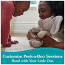 A girl and woman smile while playing with a Gund Baby Peek-a-Boo Flappy Elephant Plush toy, promoting bonding moments.