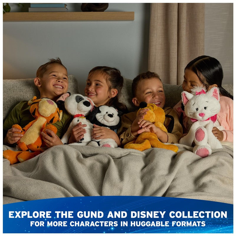 Four children sit on a couch hugging various plush toys, including Disney characters like Tigger, Snoopy, and a cat.