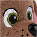 Close-up of plush toy Zuma from PAW Patrol, featuring large green and black eyes, brown fur, and a friendly expression.
