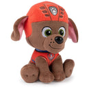 Plush toy of Zuma, a character from PAW Patrol, in a red water rescue uniform with a smiling expression.