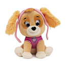 GUND Paw Patrol Skye Plush toy, a soft, brown dog with pink ears and vest, smiling and sitting upright.