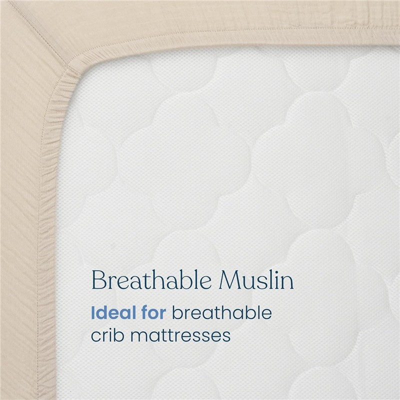 HALO full-size fitted crib sheet in oat color, featuring breathable muslin fabric, ideal for breathable crib mattresses.