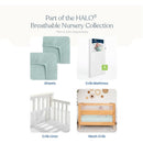 Storm grey HALO Full-Size Fitted Crib Sheets 2-Pack displayed with a crib mattress, crib liner, and mesh crib.