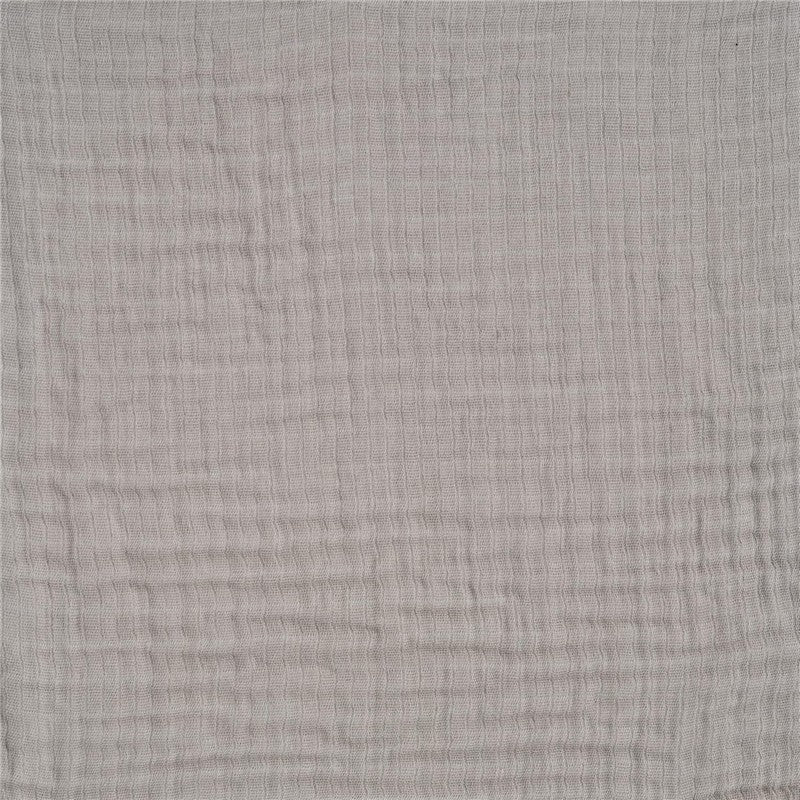 Full-size fitted crib sheet in storm grey, featuring a soft, textured fabric with subtle vertical stripes.