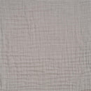 Full-size fitted crib sheet in storm grey, featuring a soft, textured fabric with subtle vertical stripes.