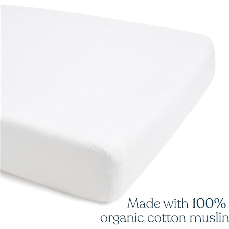 Full-size fitted crib sheet made from 100% organic cotton muslin, shown in white with a soft, textured appearance.