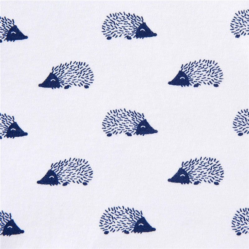 Navy hedgehog pattern on a white fabric, designed for HALO SleepSack Swaddle in cotton, 1.5 TOG, size small.