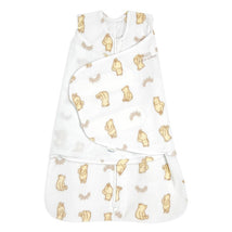 HALO SleepSack Swaddle in micro-fleece, featuring a Sunshine Winnie design with light-colored bear patterns.