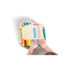 Dynamic Pixel Piano by Hape, featuring colorful keys and light-up buttons, with a child playing.