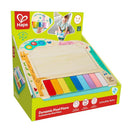 Hape Dynamic Pixel Piano packaging showcasing a colorful wooden piano with multi-colored keys and an interactive interface for children.