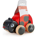 Hape Ladybug Pull Along toy with a red body, black head, and wooden wheels, designed for children 18 months and up.