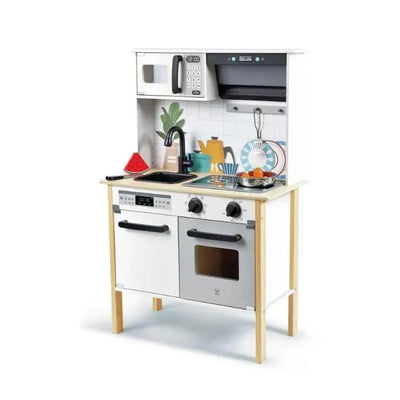 Modern toy kitchen set with a microwave, oven, sink, and cooking utensils, featuring colorful food items and decor.