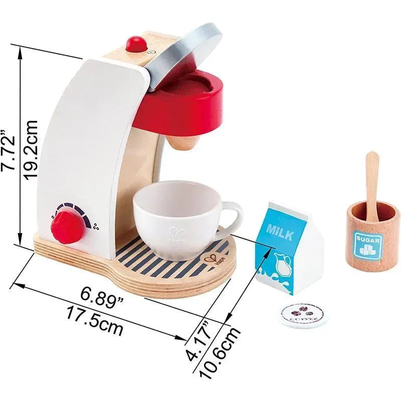 Wooden toy coffee machine set with red top, white base, a cup, milk carton, sugar container, and coffee pod.