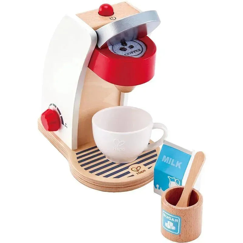 Wooden toy coffee machine set by Hape, featuring a red coffee maker, a white cup, milk and sugar containers.