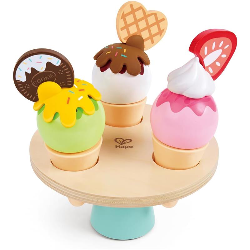 Colorful wooden ice cream set by Hape featuring three scoops in cones, with toppings and a spinning base.